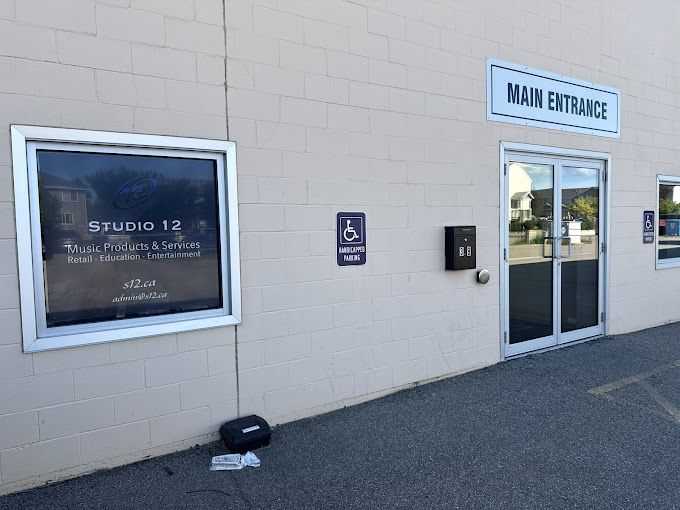 The main entrance to Studio 12 West in Fairhaven, with the Studio 12 window sign